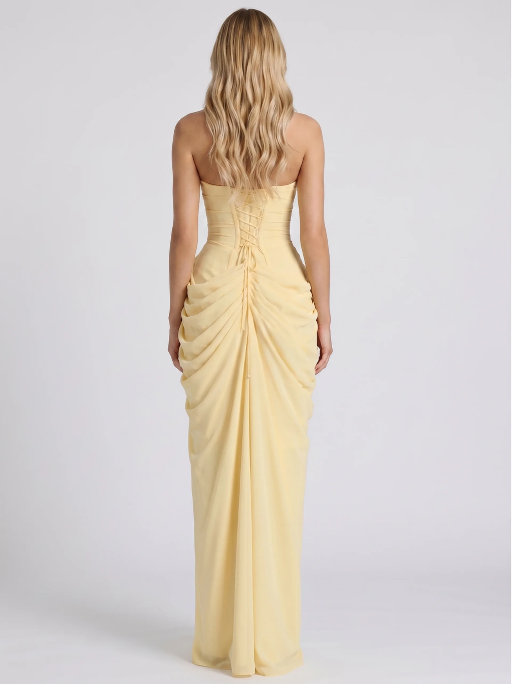 Vivi strapless ruched maxi dress with draped skirt in Yellow — back view