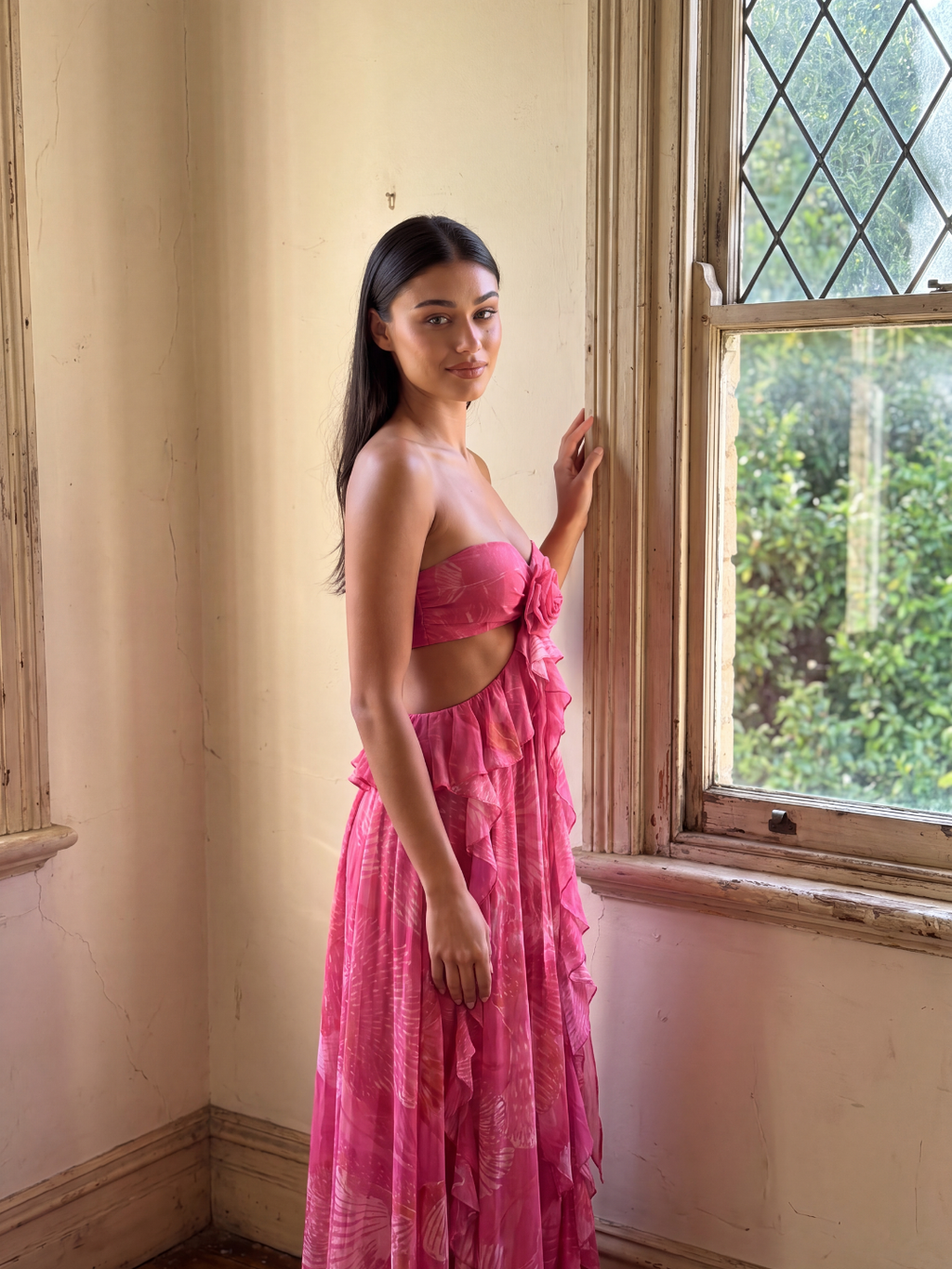 Freya cut-out ruffle maxi dress in Dark Pink — rosette detail view