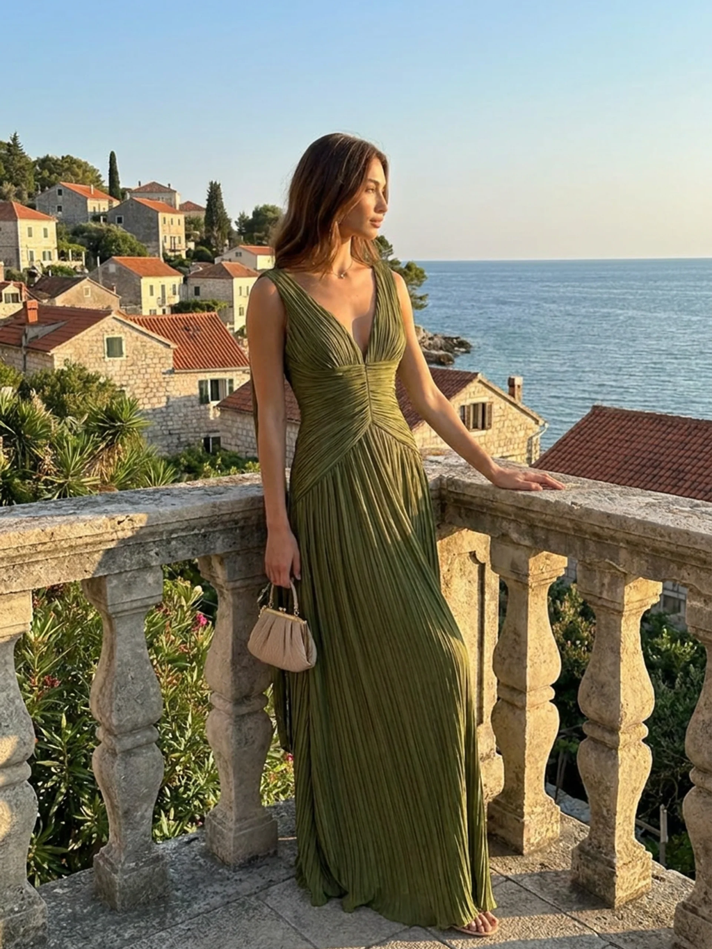 Yara pleated maxi dress with high slit in burgundy — front view
