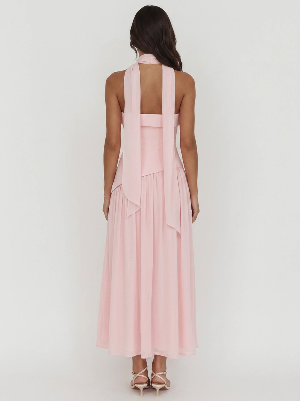 Pippa strapless asymmetric waist drop-skirt maxi dress in pink — back view