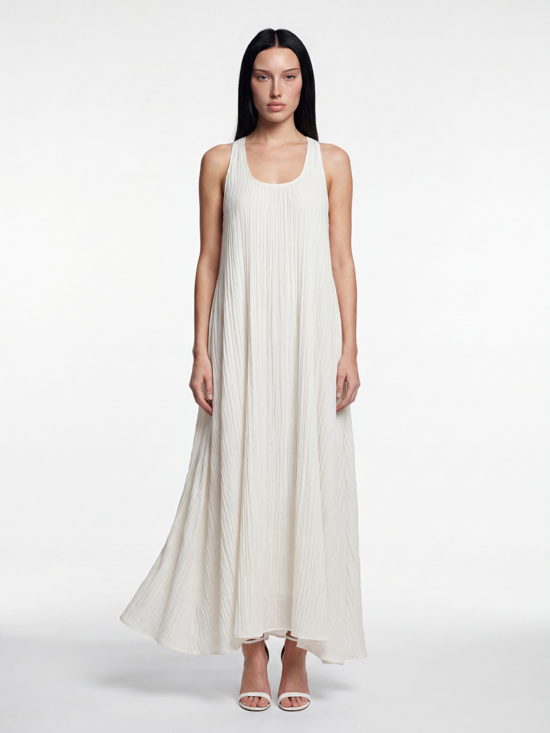 Nora sleeveless pleated maxi dress in White — front view