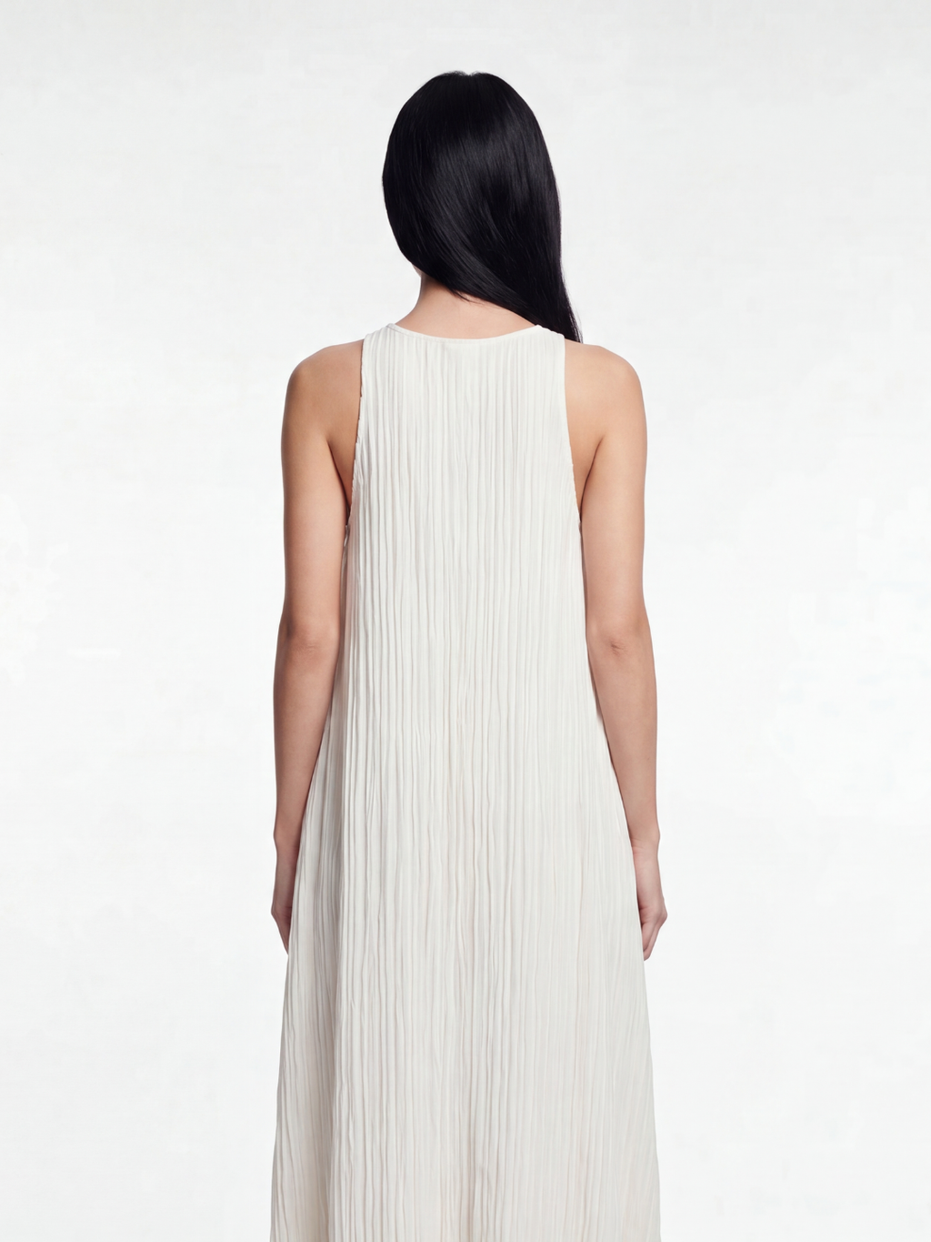 Nora sleeveless pleated maxi dress in White — back view