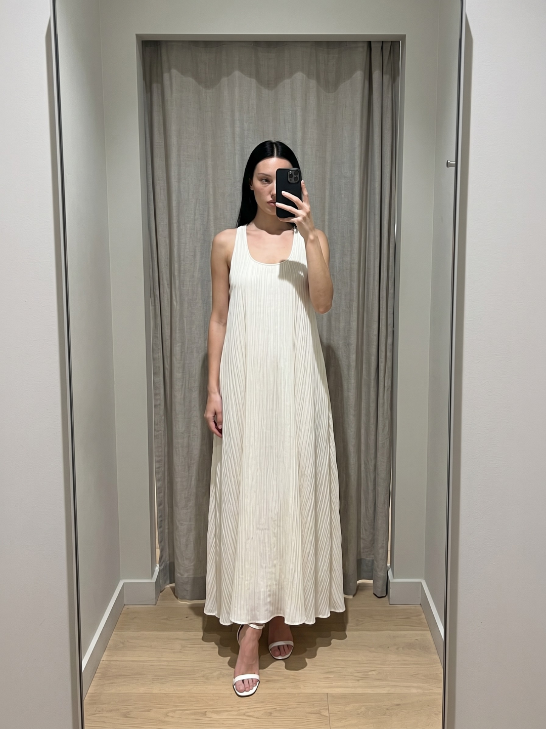 Nora sleeveless pleated maxi dress in White — side view