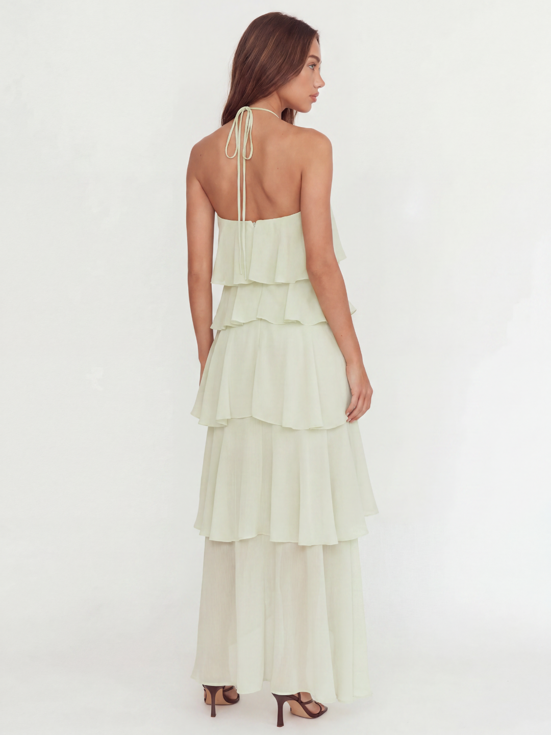 Nia halterneck tiered ruffle maxi dress in light green — back view