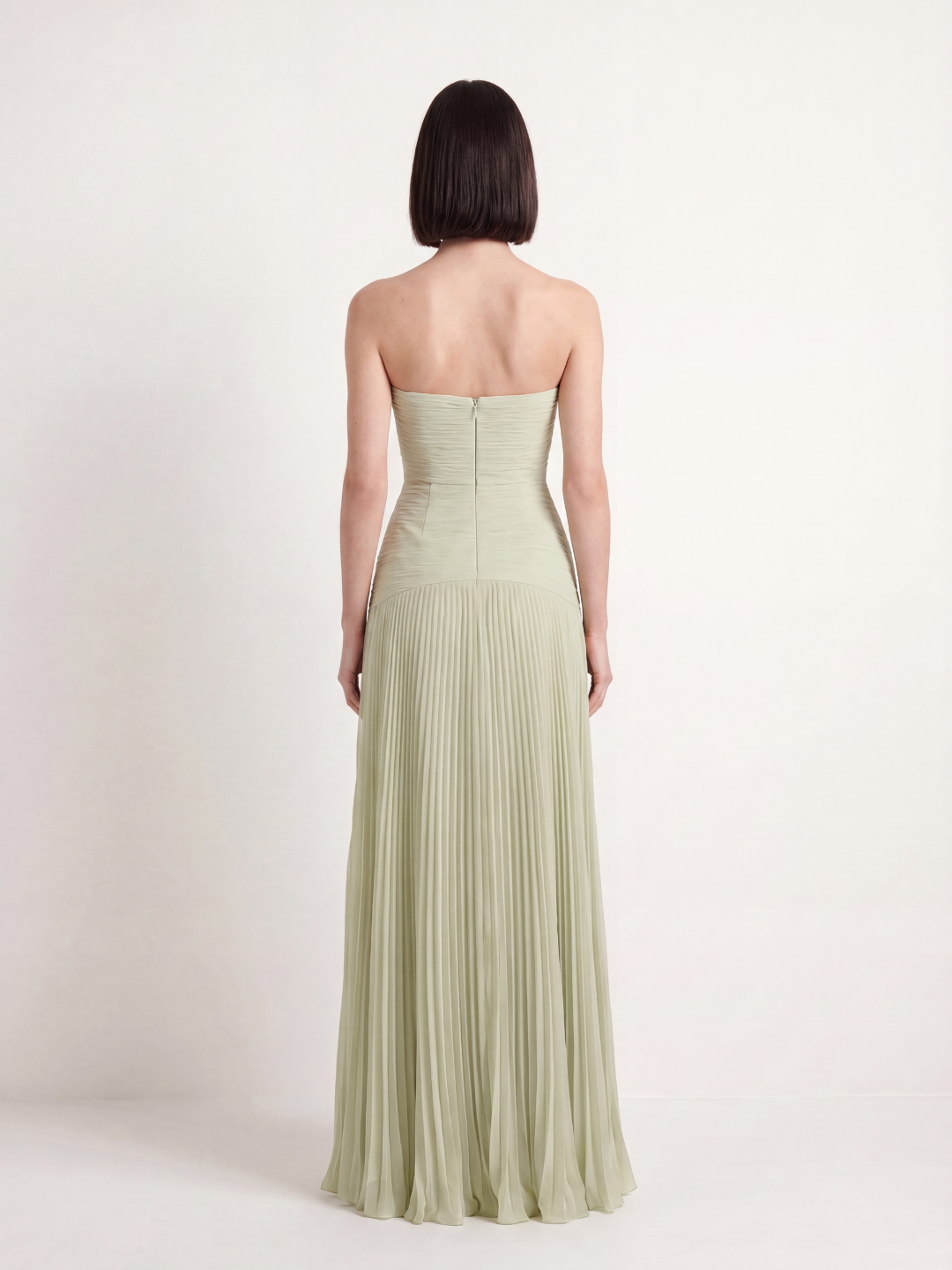 Jade strapless ruched dropped-waist pleated maxi dress in sage green — back view