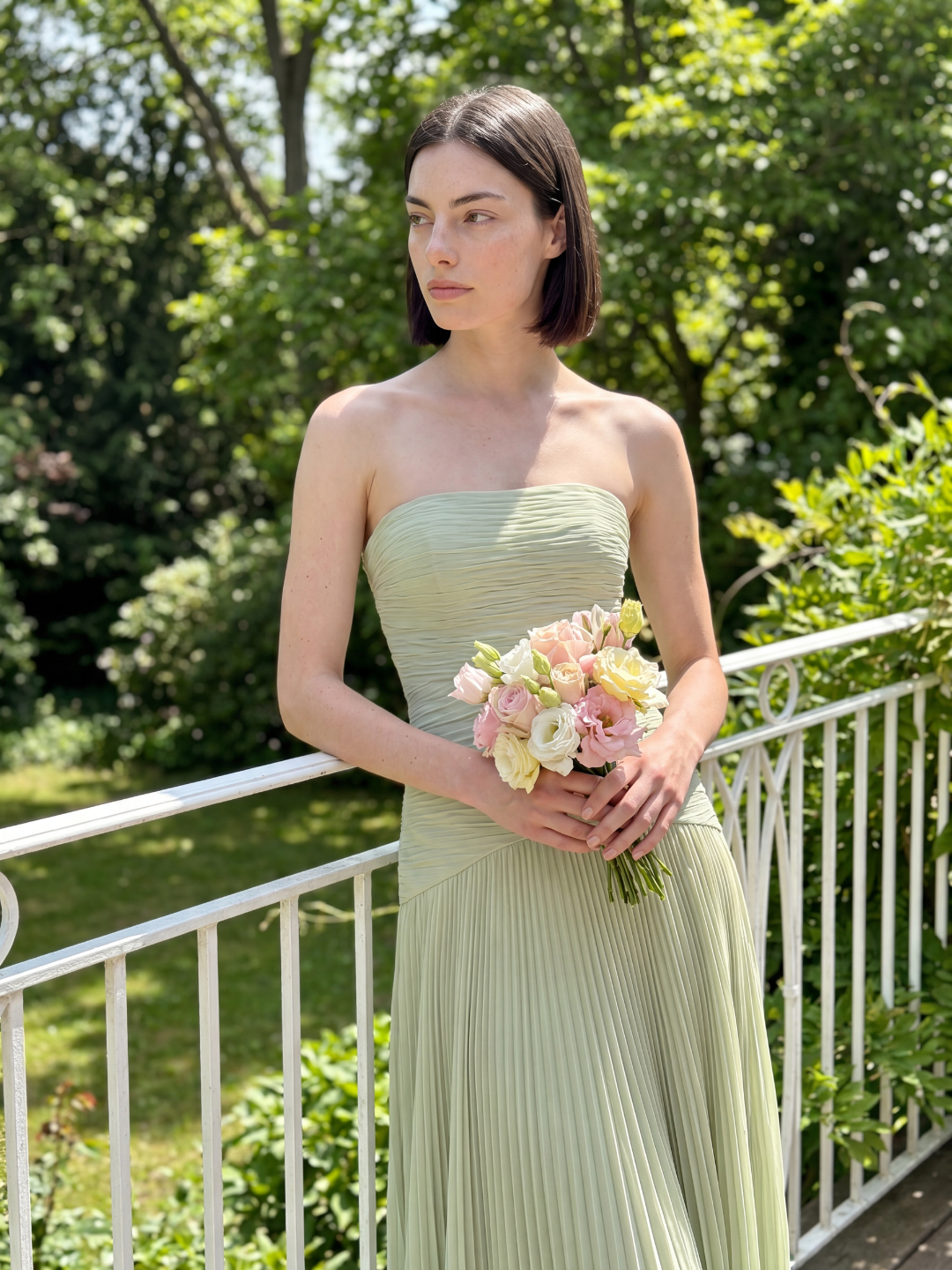 Jade strapless ruched dropped-waist pleated maxi dress in sage green — side view