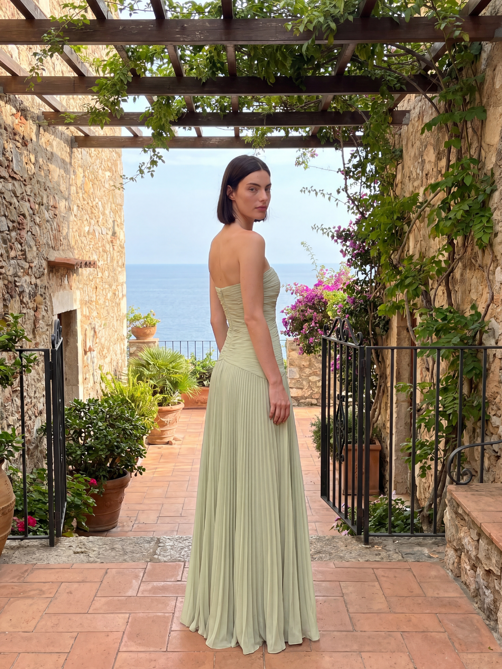 Jade strapless ruched dropped-waist pleated maxi dress in sage green — detail view