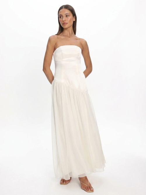 Arlo strapless asymmetric drop-waist maxi dress in white — front view