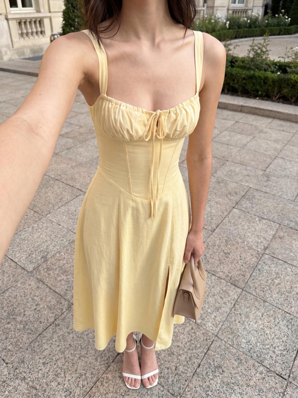 Sadie corset midi dress with side split in light yellow — side view