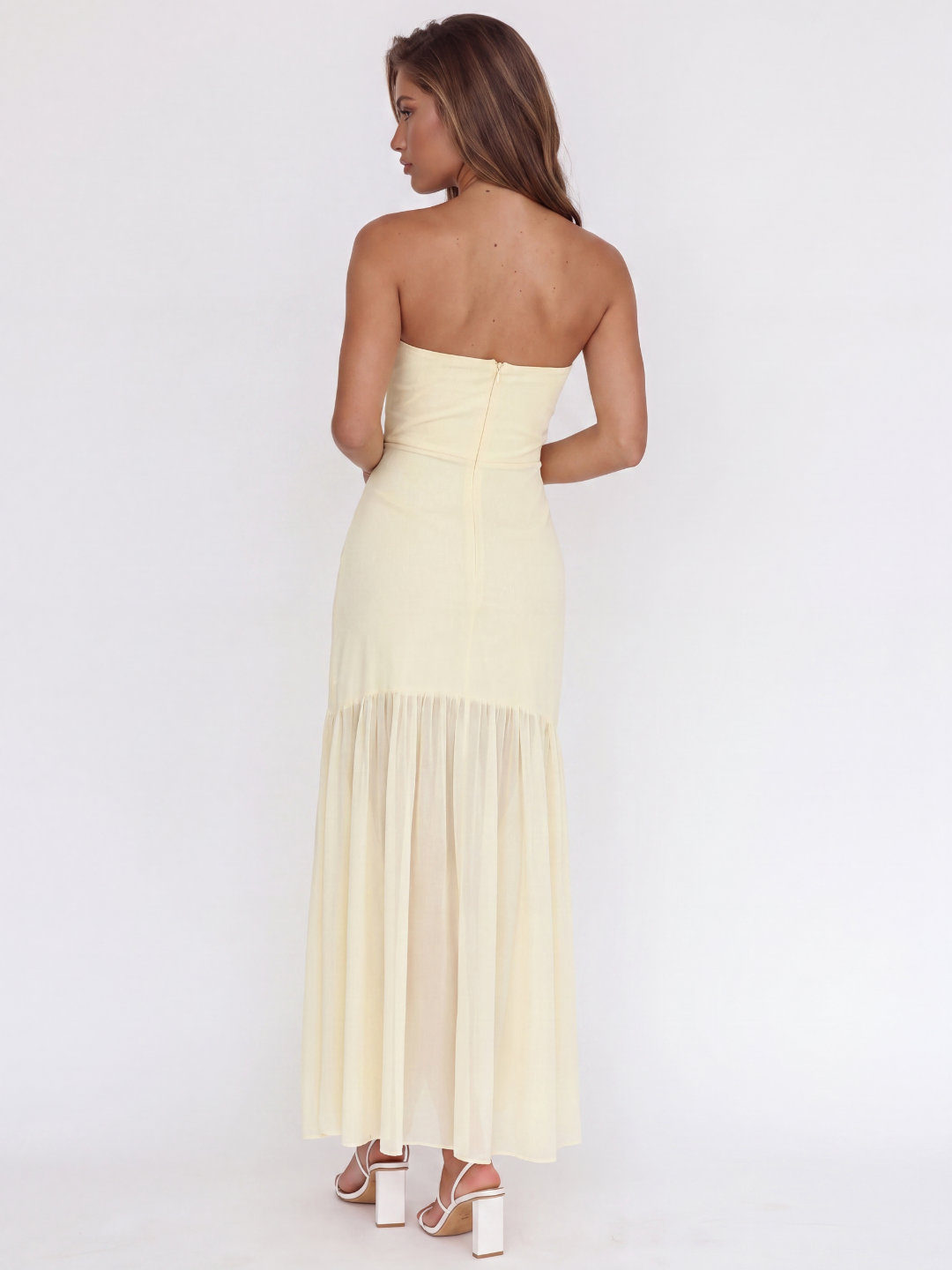 Honor strapless sheer-hem drop-waist midi dress in light yellow — back view