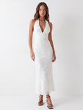 Capri backless halter maxi dress with floral embellishment in white — front view