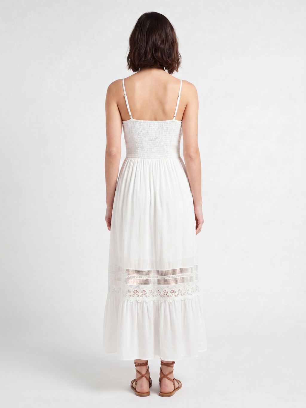 Celine V-neck lace-trim tiered maxi dress in white — back view