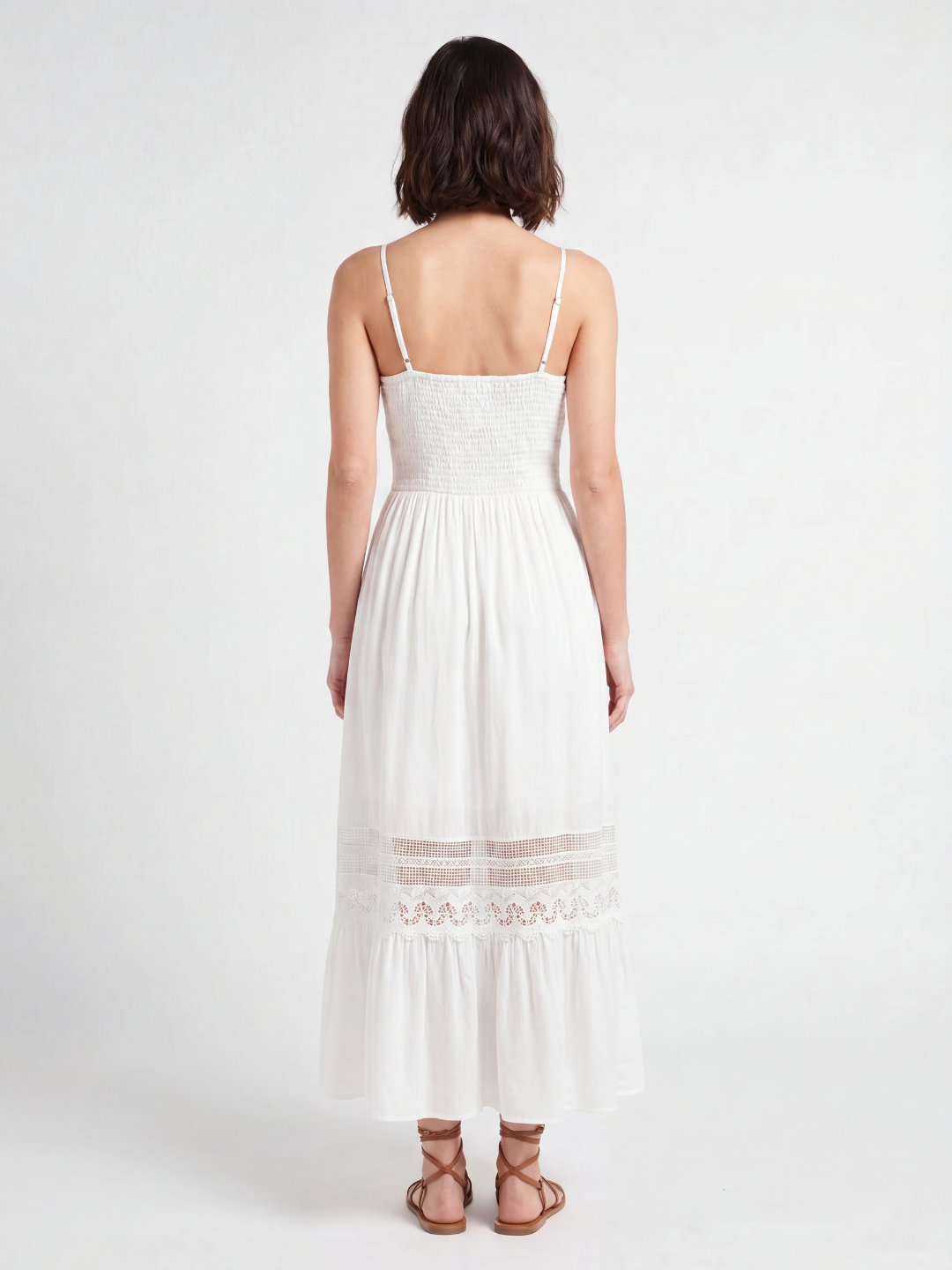Celine V-neck lace-trim tiered maxi dress in white — back view