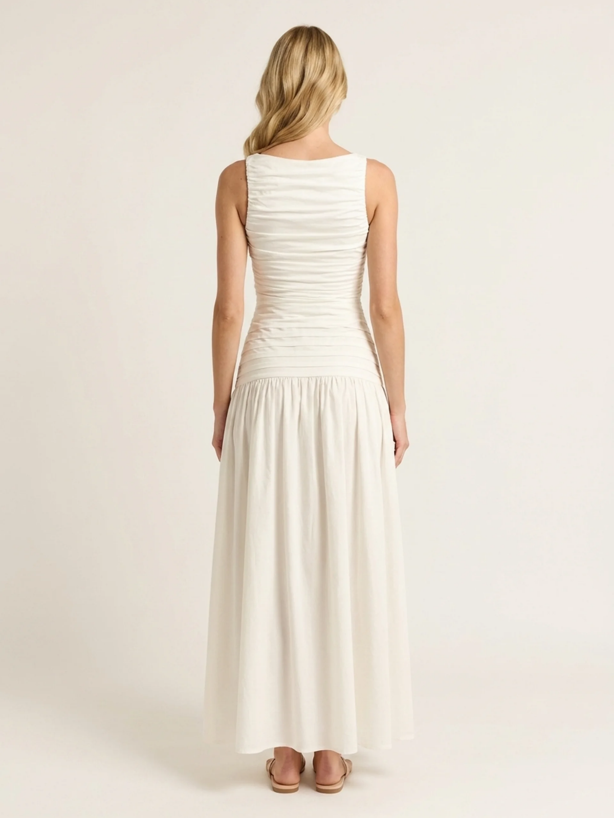 Nina high-neck pintuck drop-waist maxi dress in white — back view