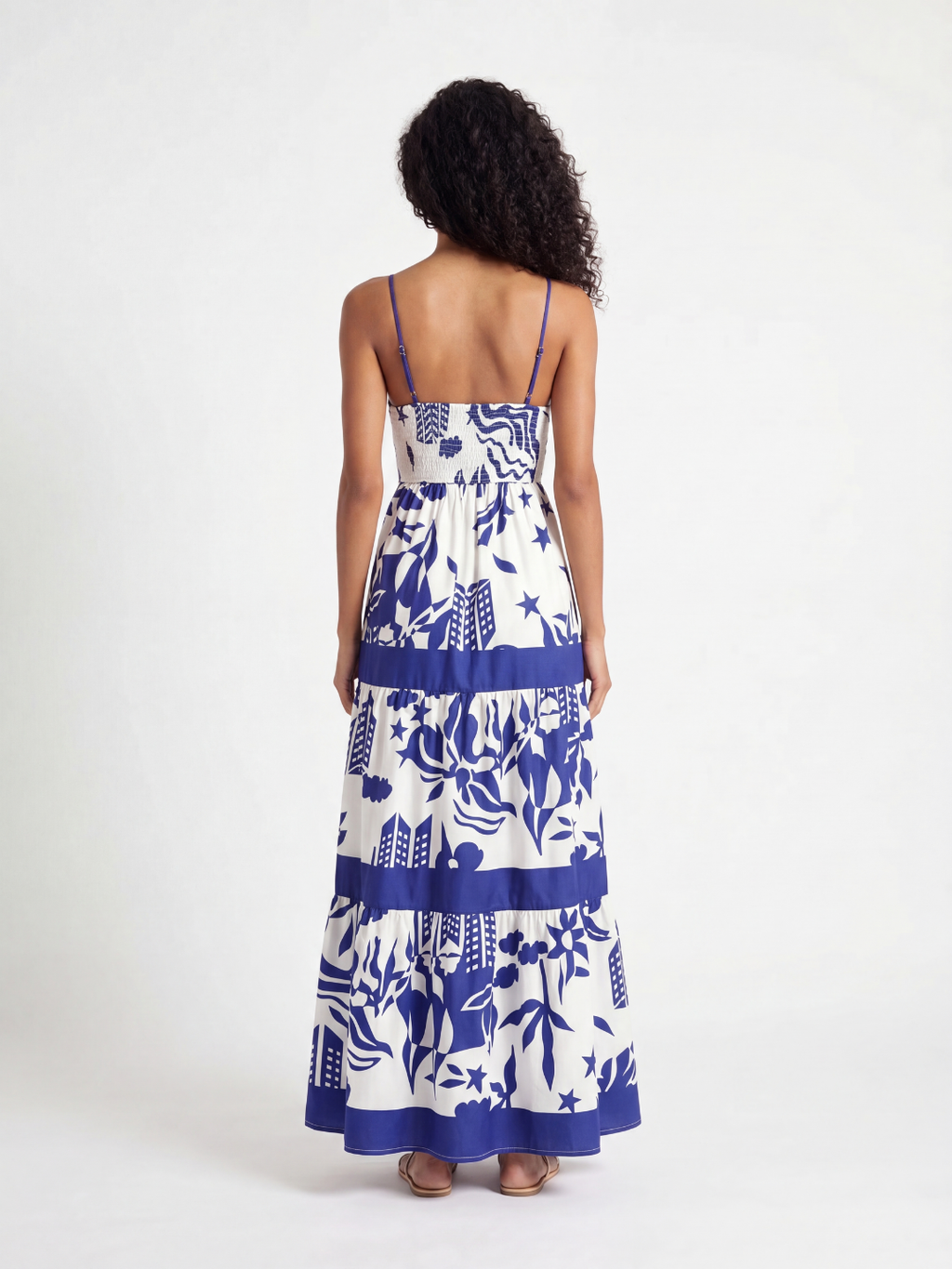 Ivy square-neck tiered maxi dress in blue tropical print — back view