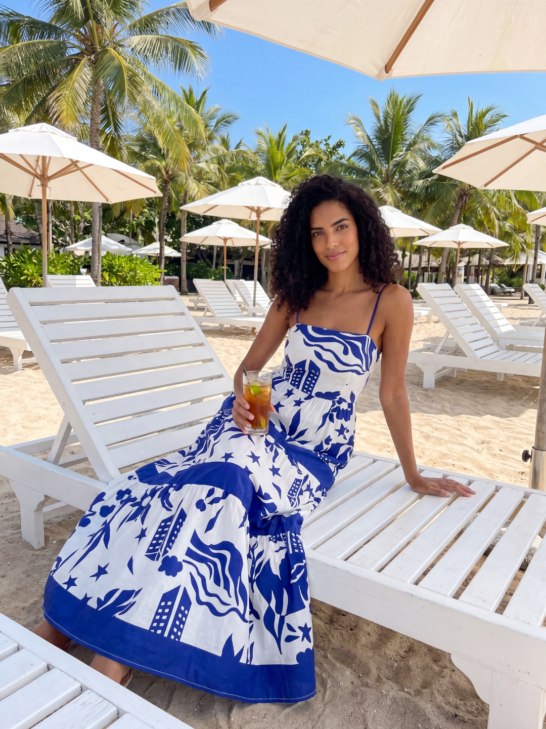 Ivy square-neck tiered maxi dress in blue tropical print — detail view