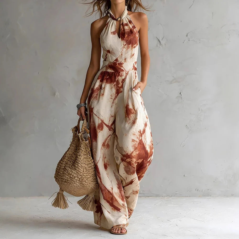 Elodie watercolour print halterneck wide-leg jumpsuit — styled view