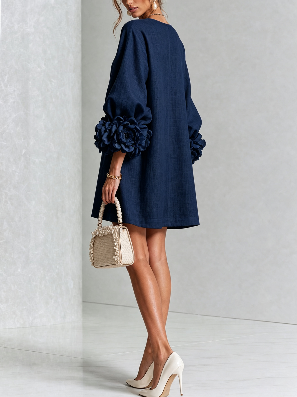 Ivory long sleeve mini dress with rosette cuffs and floral buttons - view 13