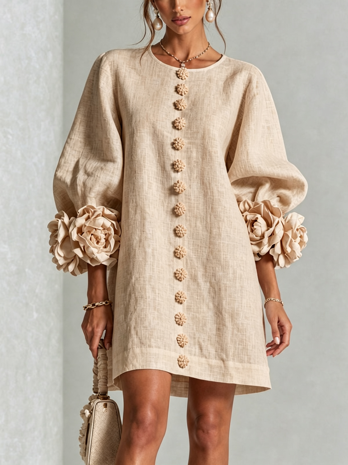 Ivory long sleeve mini dress with rosette cuffs and floral buttons - view 23
