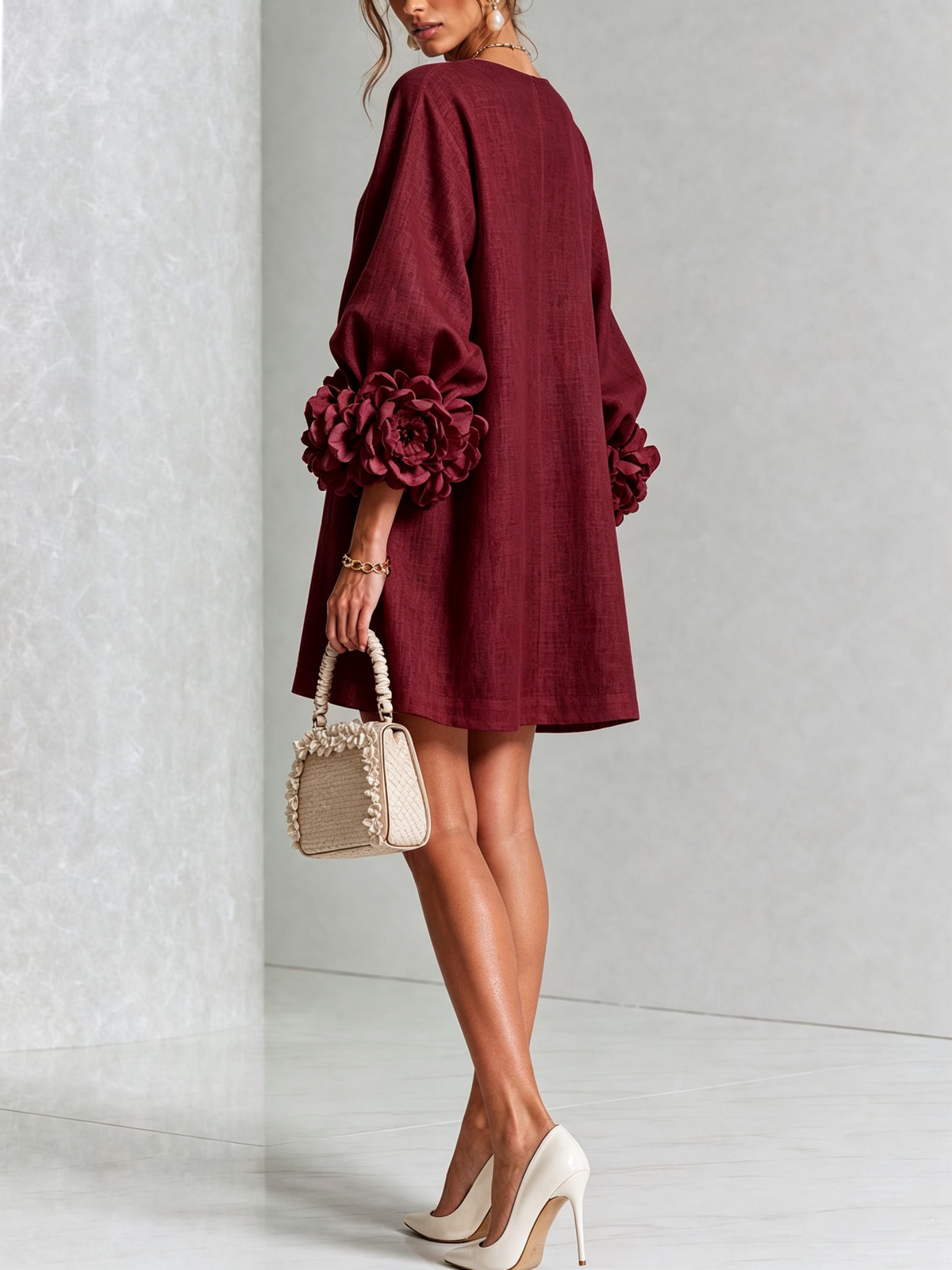 Ivory long sleeve mini dress with rosette cuffs and floral buttons - view 37