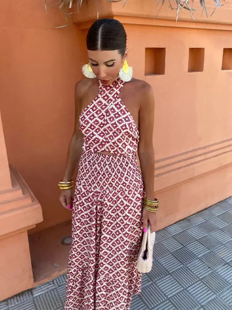 Woman wearing a red and cream geometric print halter crop top and matching maxi skirt set - view 4