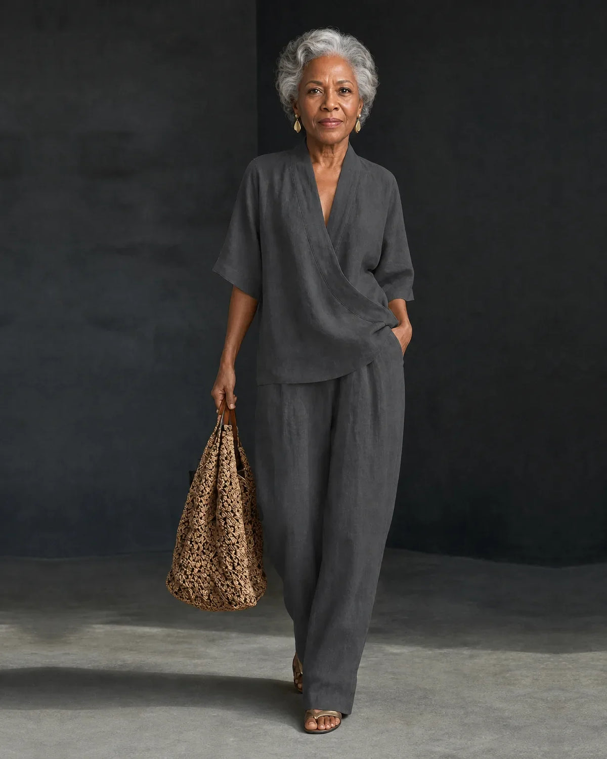 Woman wearing a V-neck two piece set with wide leg pants - view 2
