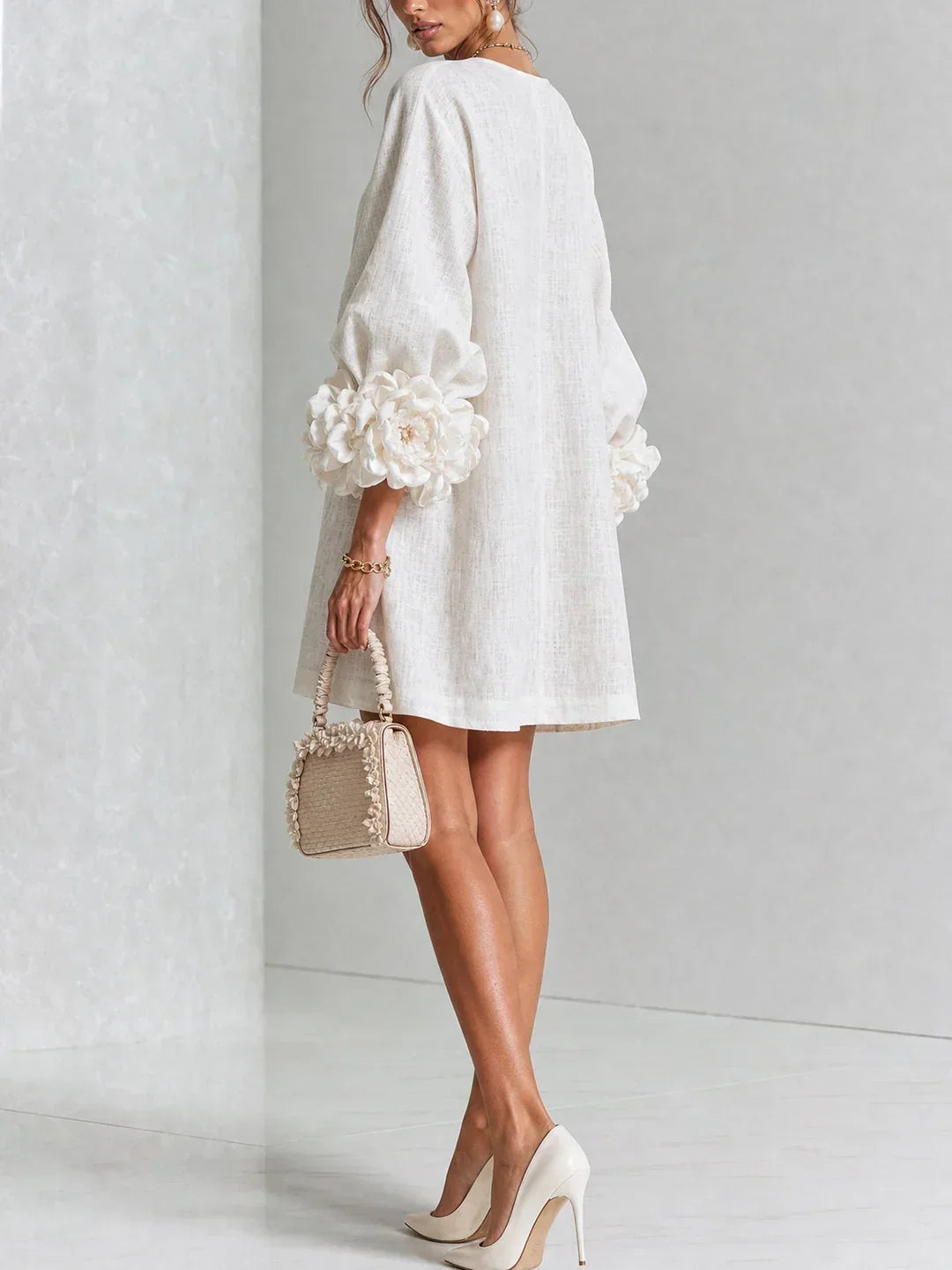 Long sleeve mini dress with rosette cuffs and flower-shaped buttons - view 6