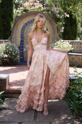 Woman wearing a floral corset maxi dress with a beaded halter neckline and a ruffle hem