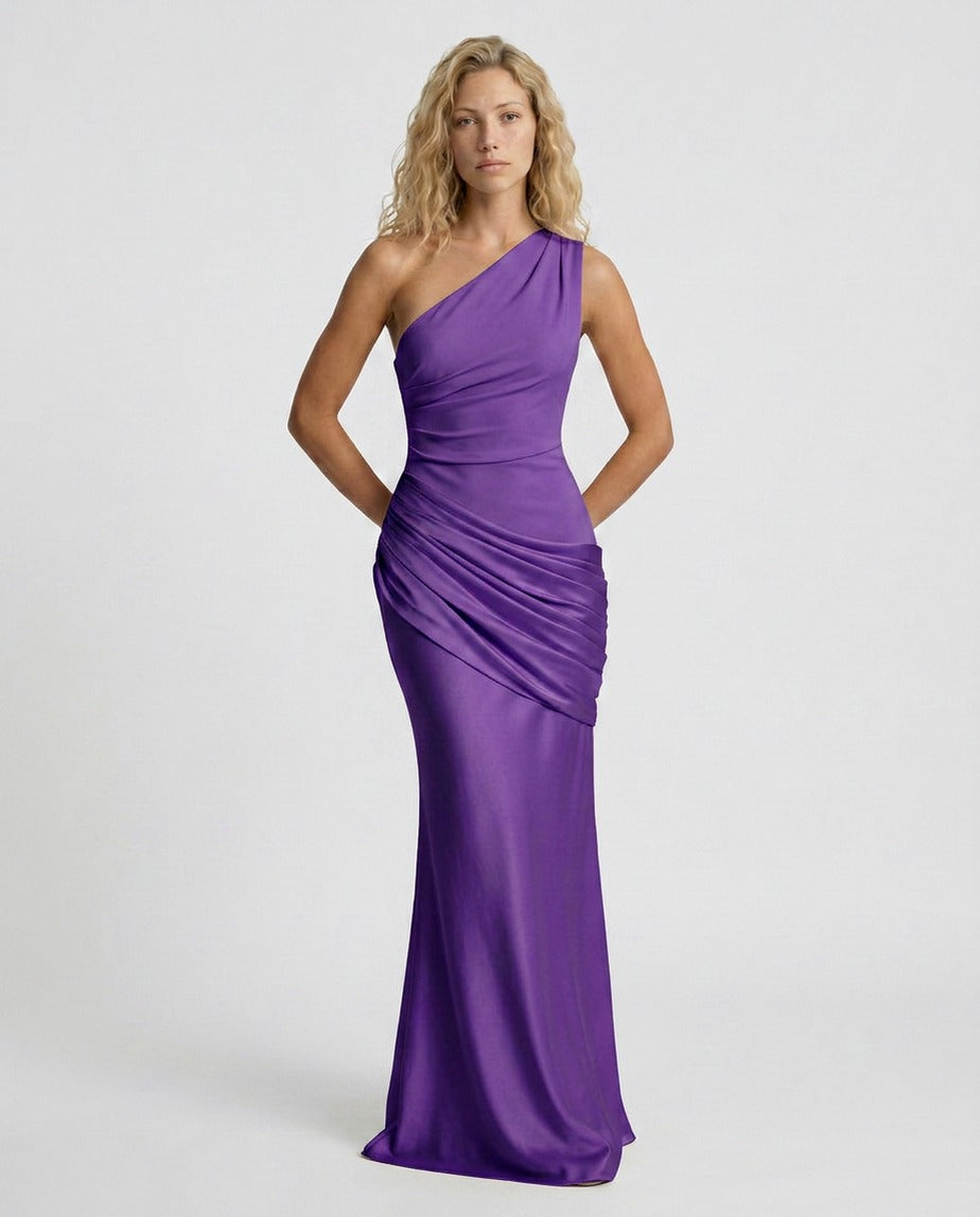 Woman wearing a one shoulder satin formal maxi dress with ruched bodice and draped hip panel - view 34