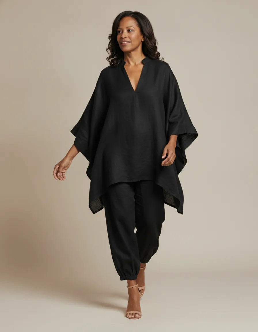 Woman in a black batwing V-neck tunic and cuffed pants matching set - view 3