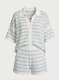 Woman wearing a striped knit two piece set with a polo collar top and matching shorts - view 4
