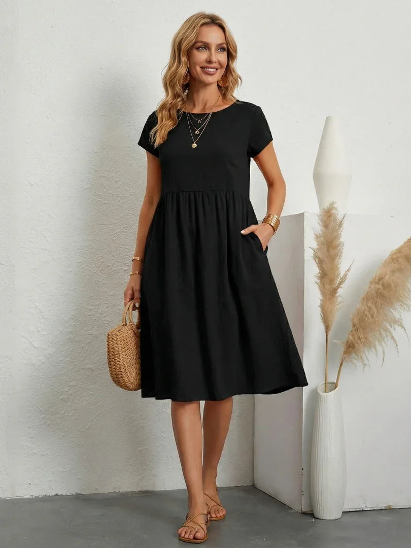 Lillian crew-neck gathered knee-length dress with pockets — styled view