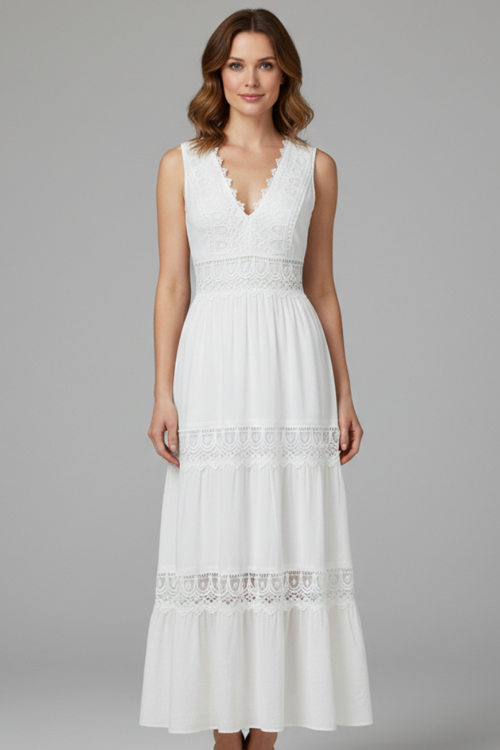 Woman wearing a white sleeveless lace maxi dress with V-neck and tiered skirt - view 2