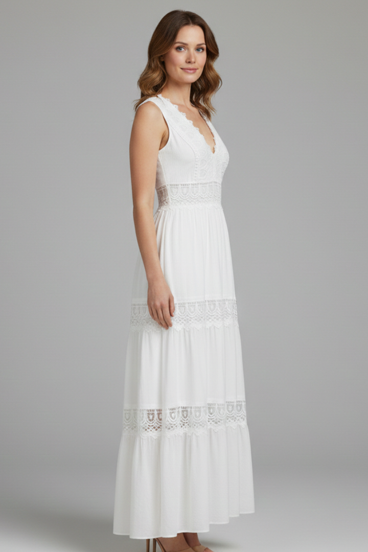 Woman wearing a white sleeveless lace maxi dress with V-neck and tiered skirt - view 4