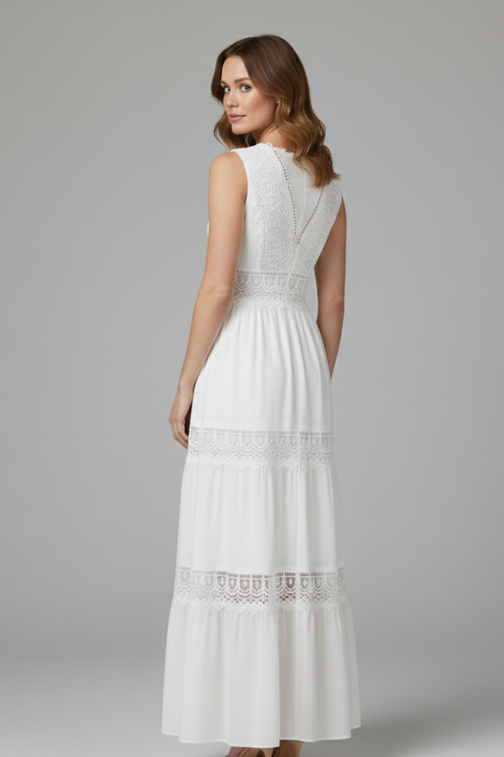 Woman wearing a white sleeveless lace maxi dress with V-neck and tiered skirt - view 5