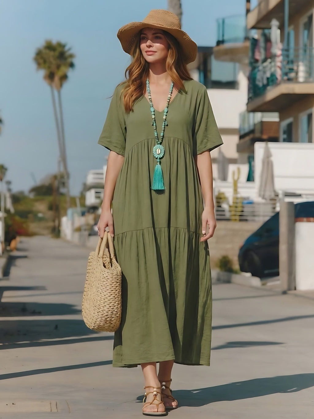 Woman wearing a V-neck tiered maxi dress with short sleeves - view 15