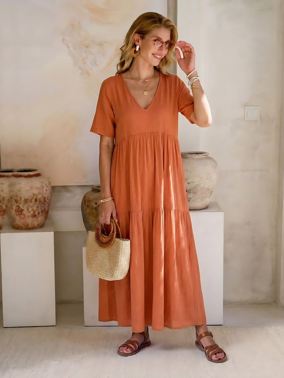 Woman wearing a V-neck tiered maxi dress with short sleeves - view 20