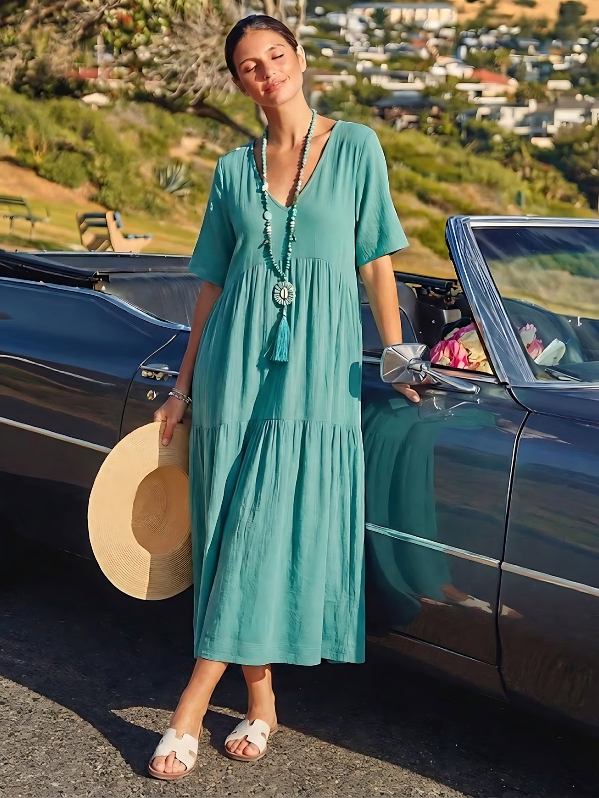Woman wearing a V-neck tiered maxi dress with short sleeves - view 55