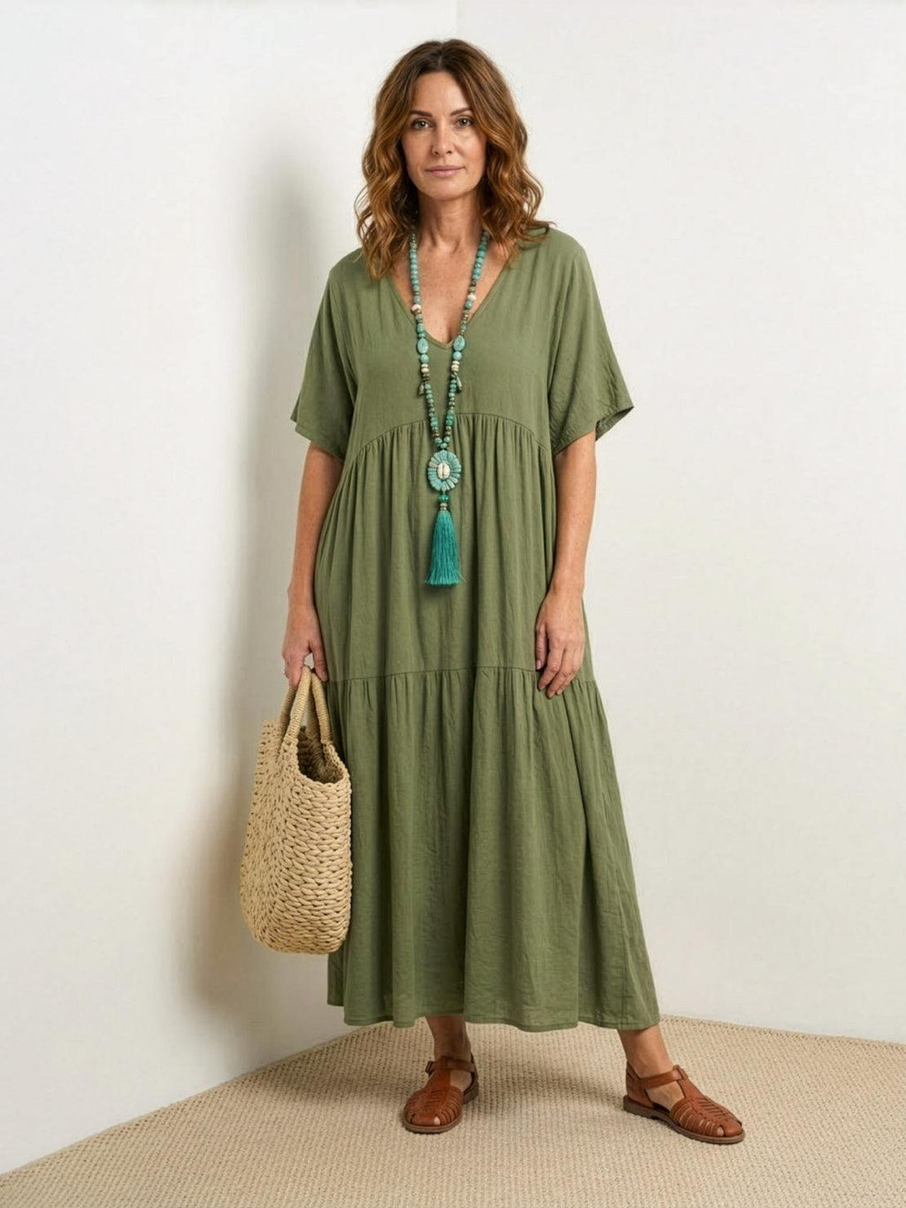 Woman wearing a V-neck tiered maxi dress with short sleeves - view 8