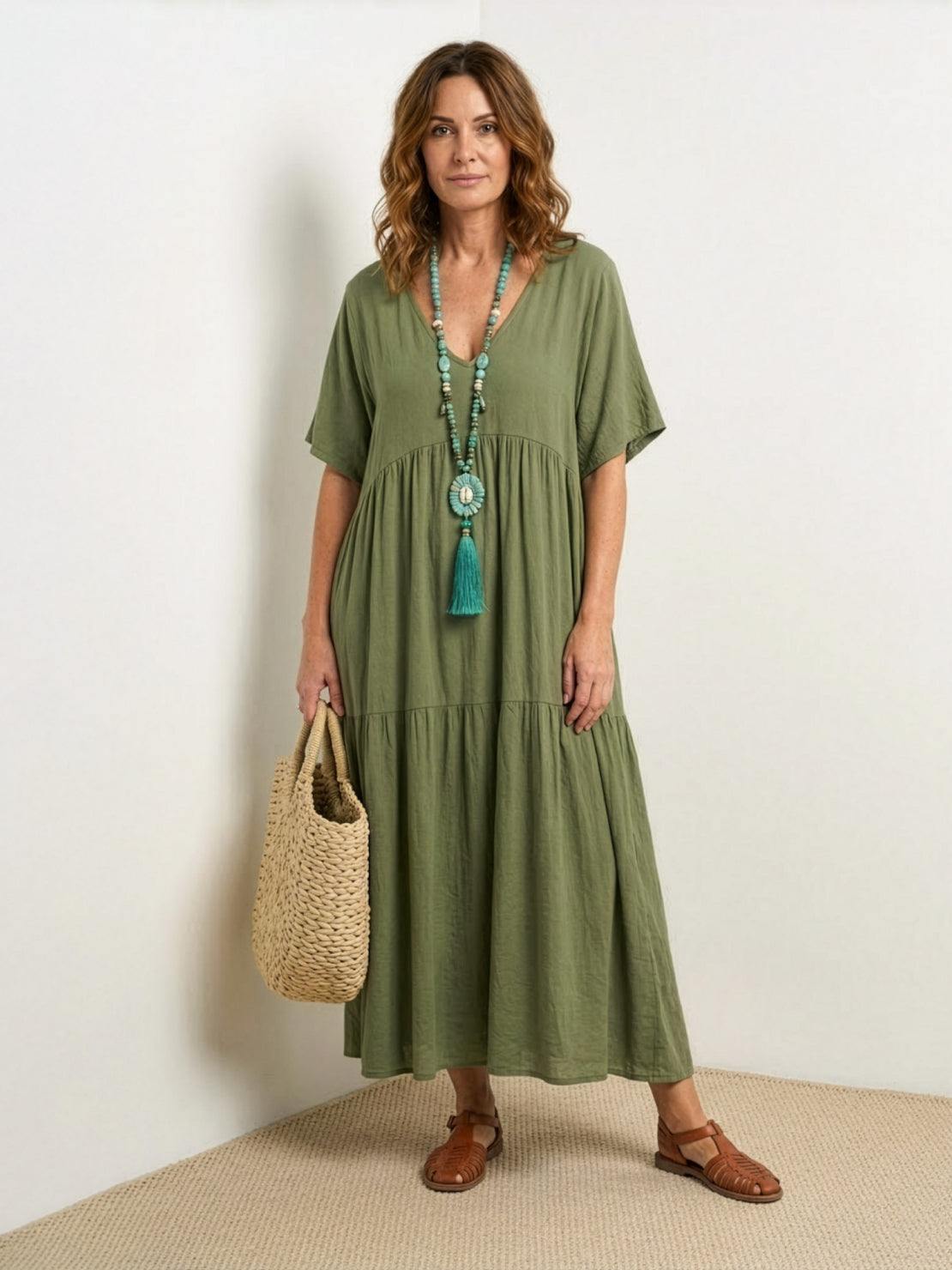 Woman wearing a V-neck tiered maxi dress with short sleeves - view 8