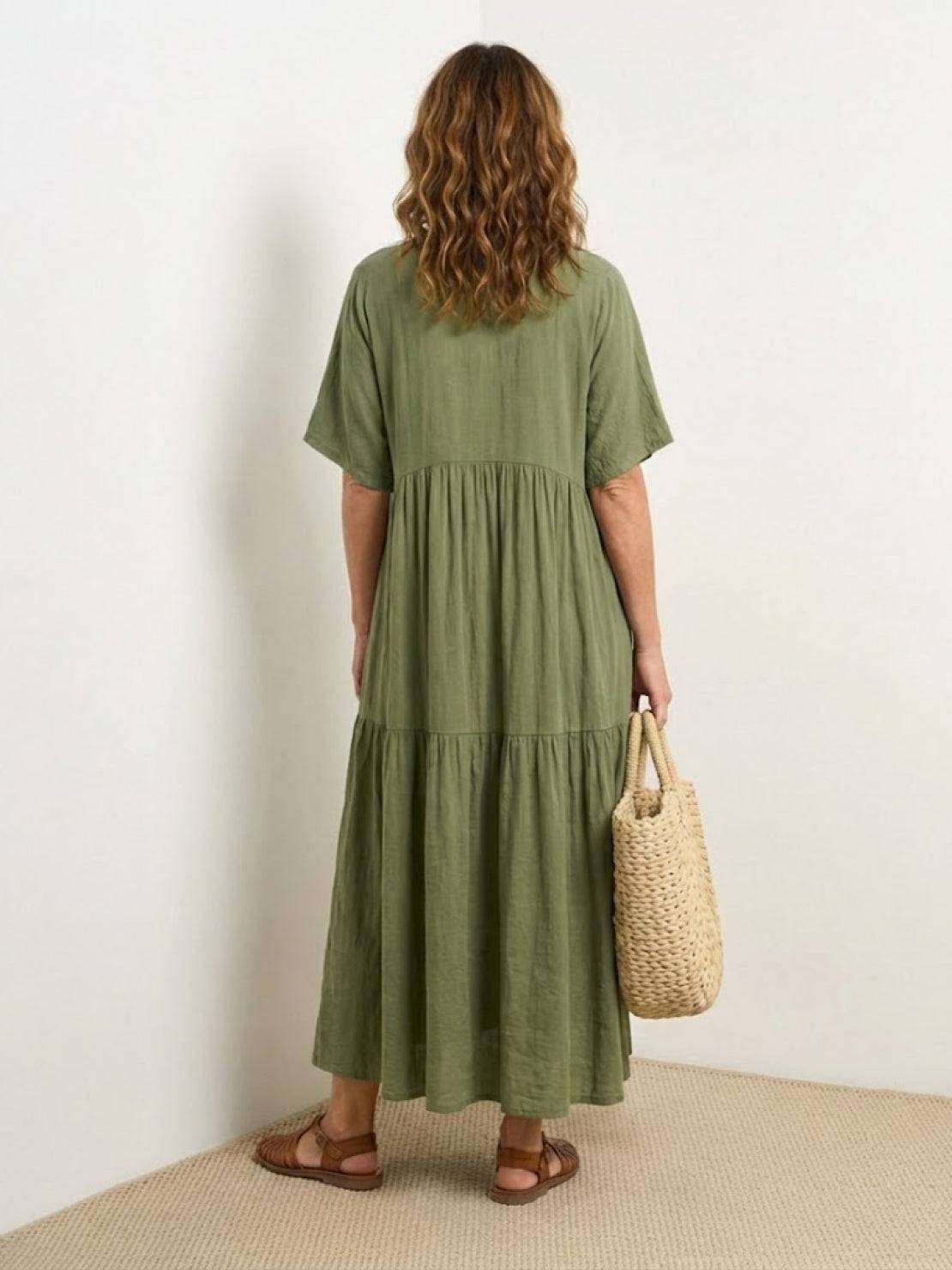 Woman wearing a tiered V-neck maxi dress with short sleeves - view 15