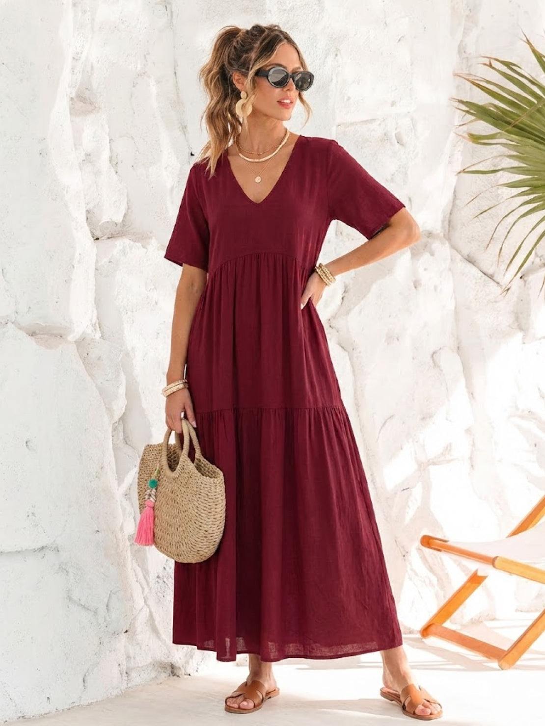 Woman wearing a tiered V-neck maxi dress with short sleeves - view 29