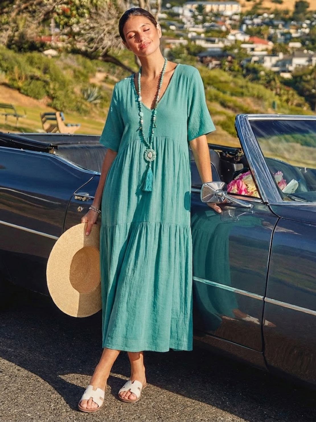 Woman wearing a tiered V-neck maxi dress with short sleeves - view 33