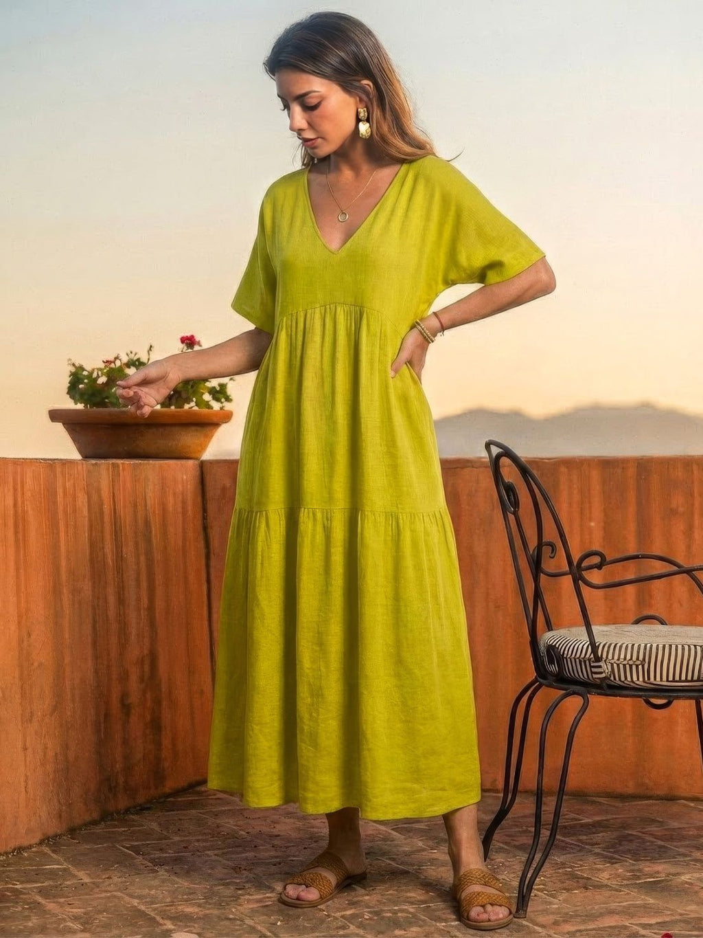 Woman wearing a tiered V-neck maxi dress with short sleeves - view 37