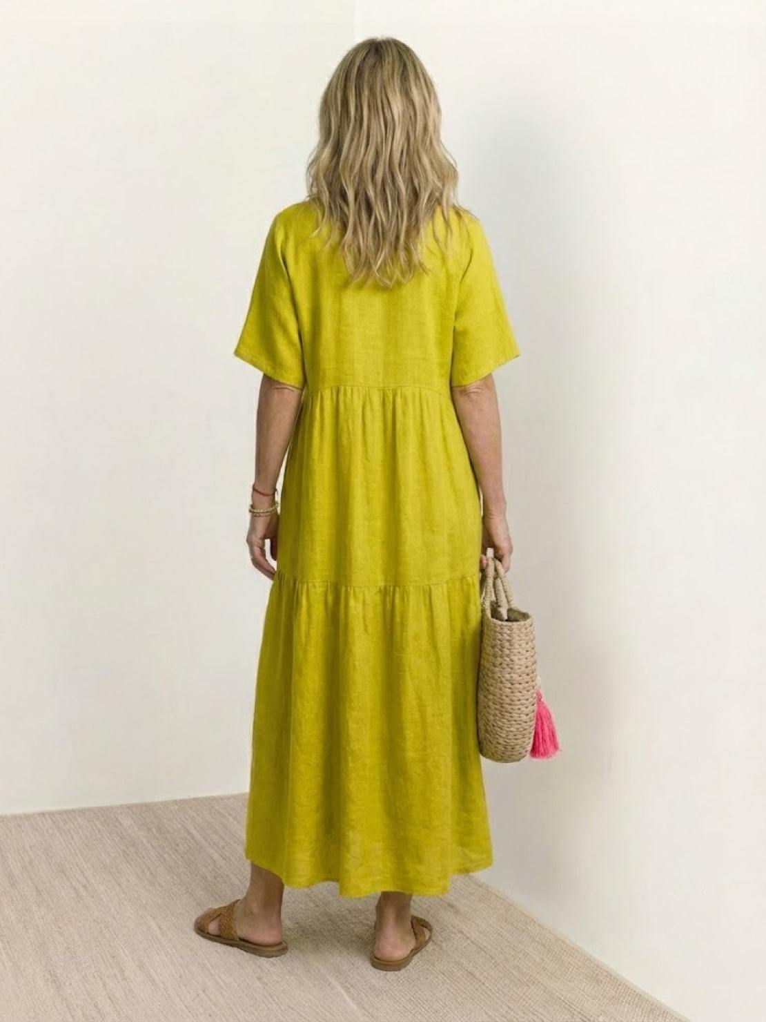 Woman wearing a tiered V-neck maxi dress with short sleeves - view 39