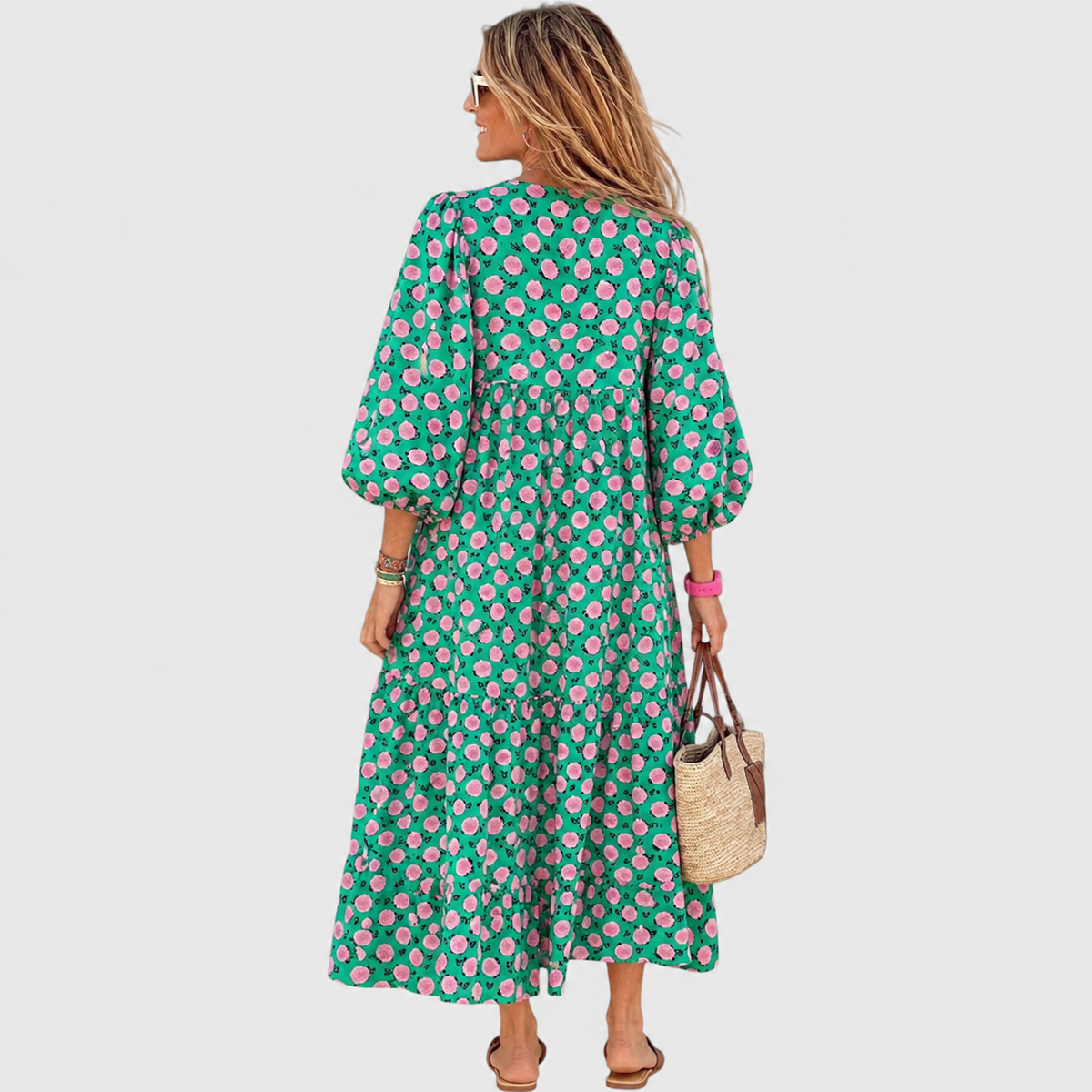 Woman wearing a printed tiered maxi dress with balloon sleeves and V-neckline - view 2
