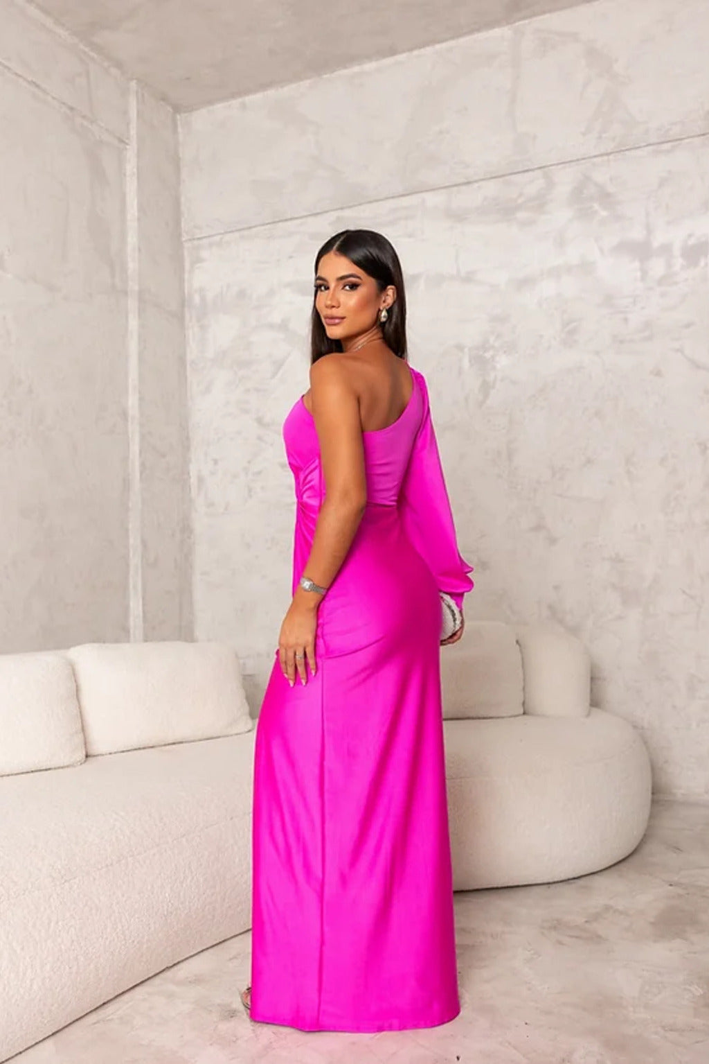 Woman wearing a one shoulder satin formal maxi dress with split sleeve and front slit - view 16
