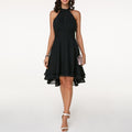 Halter neck tiered cocktail dress with gathered bodice, fitted waistband and layered high-low hem