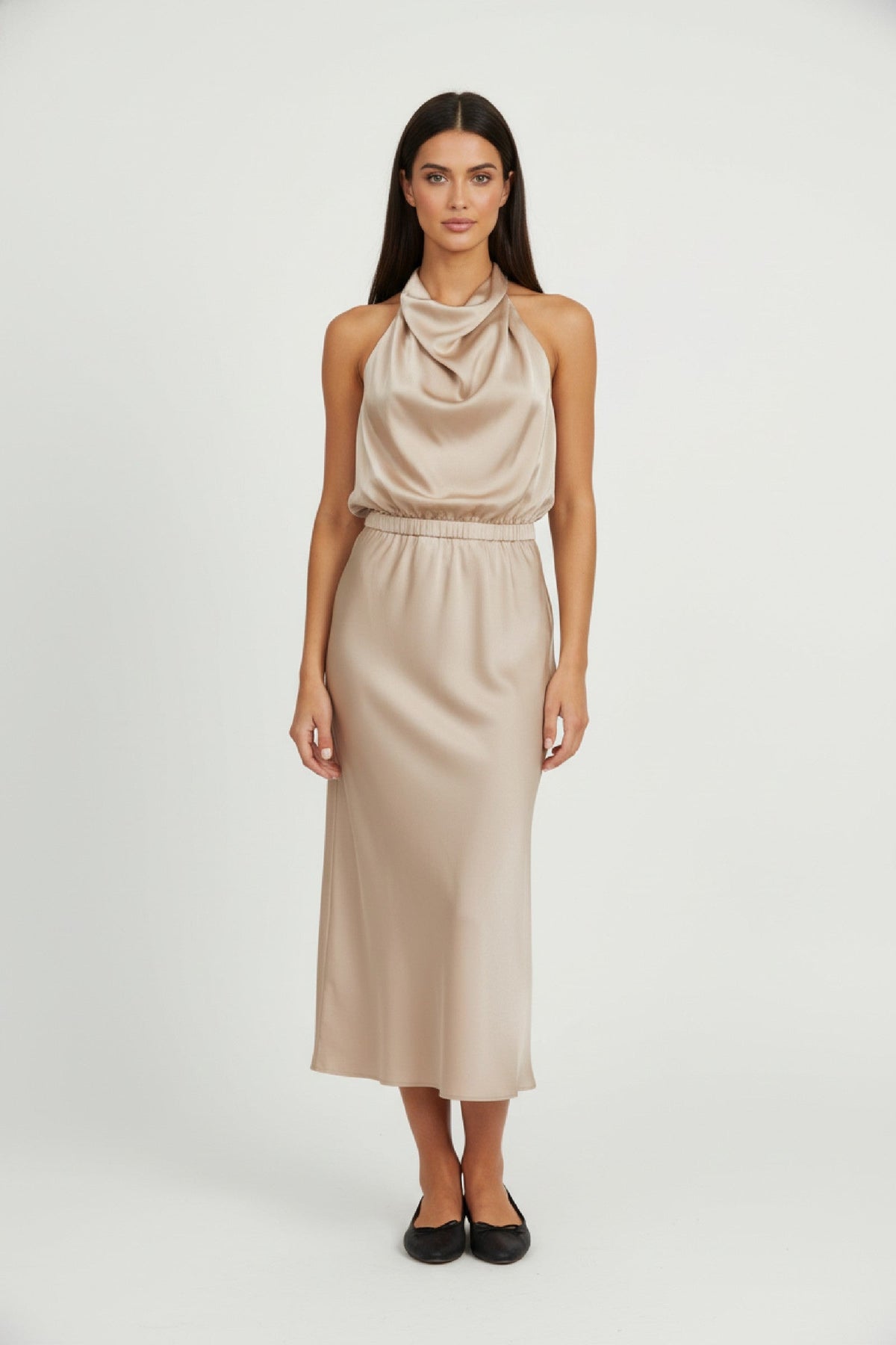 Woman wearing the Lucy satin formal midi dress with draped high neckline and cinched waist