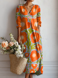 Floral print linen dress with V-neck and long sleeves in orange and blue